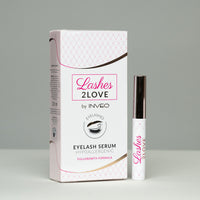 Eyelash serum packaging with 'Lashes 2Love on a gray background
